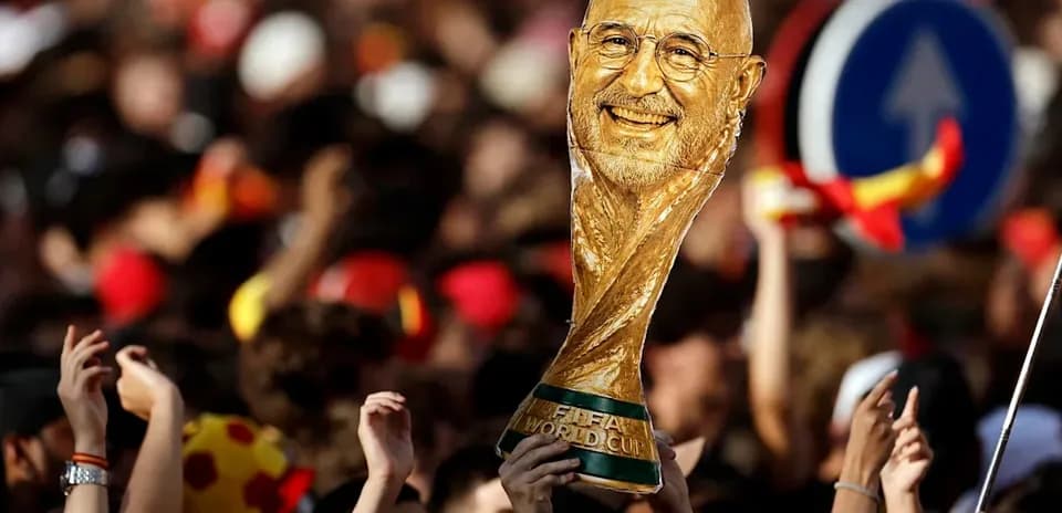 Crowd celebrating with a golden trophy in hand