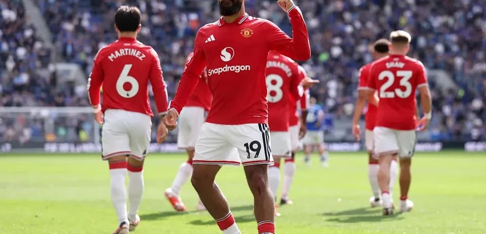 Manchester United player celebrating on the field