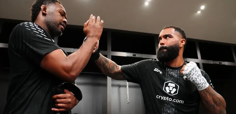 Two fighters preparing in locker room before match