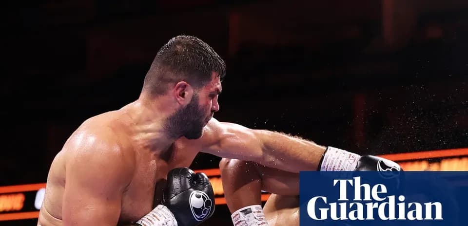 Boxer throwing a punch during a match