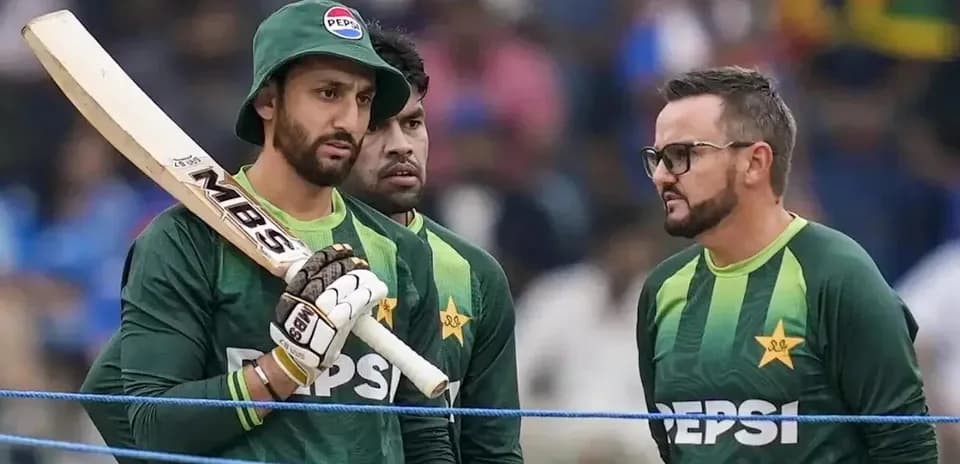 Cricket players discussing strategy before match