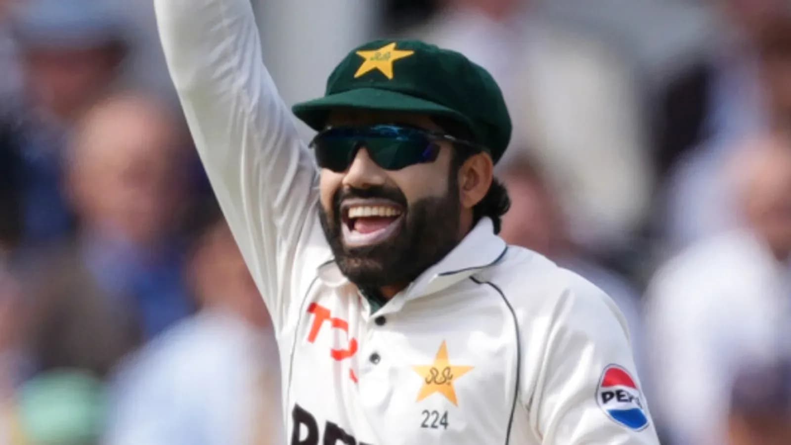 Cricketer celebrating during a match at stadium