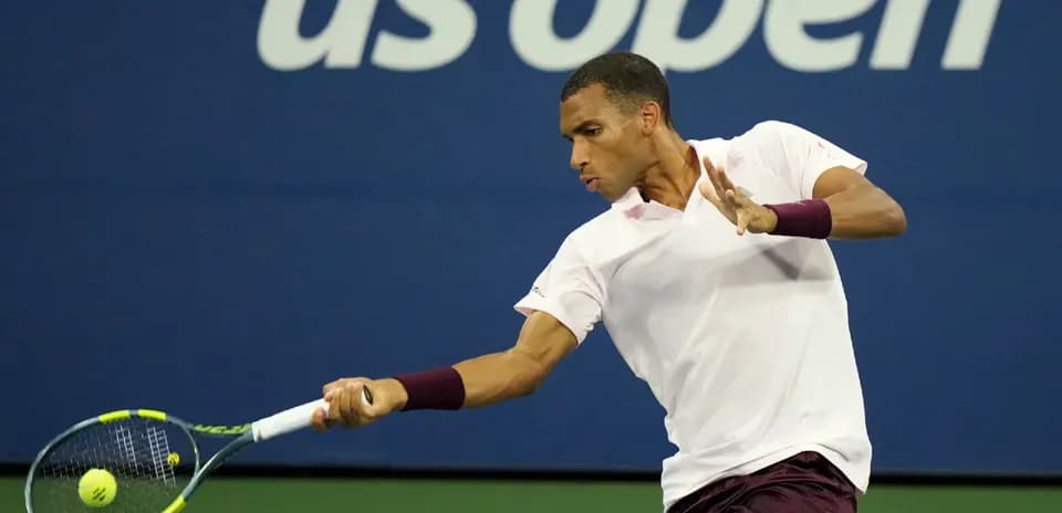 Player hitting a forehand shot at US Open
