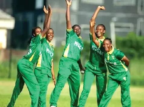 Nigerian women's cricket team celebrating on field