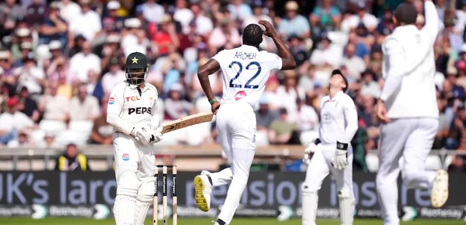 Bowler celebrating as batsman reacts in cricket match