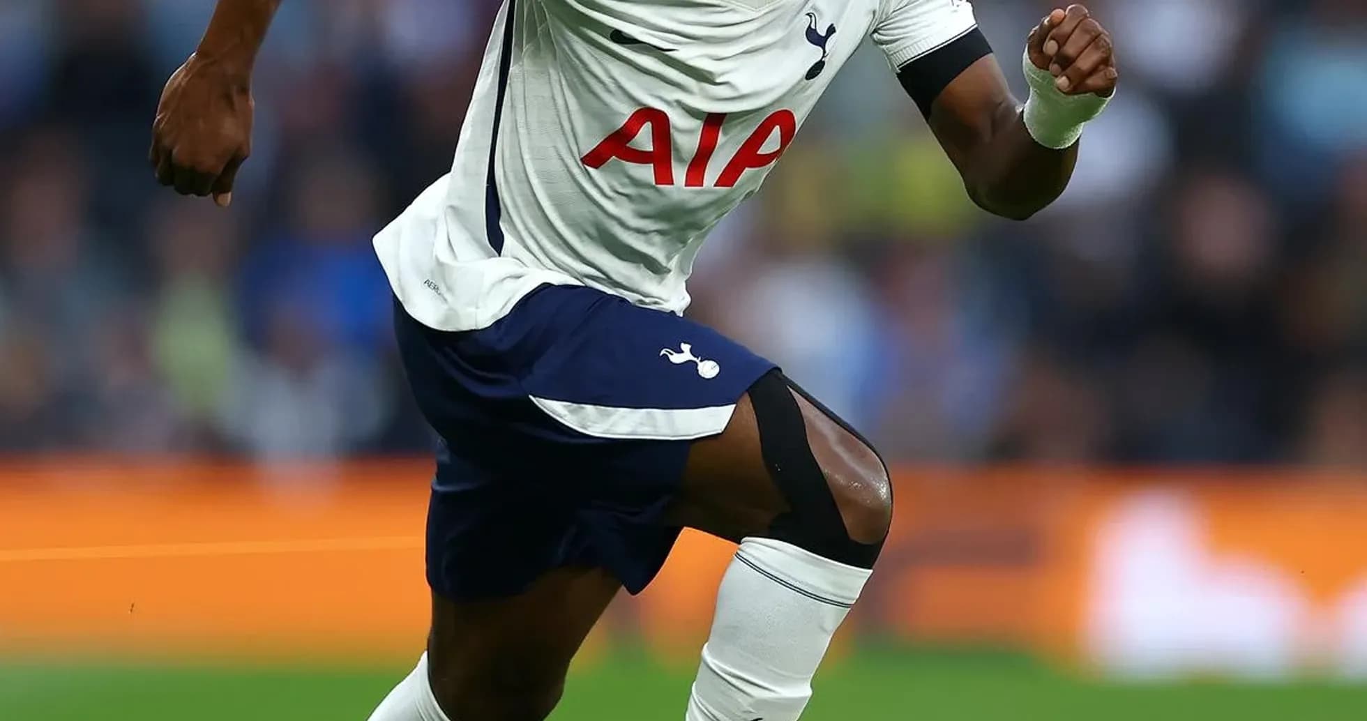 Player sprinting on the field during a match