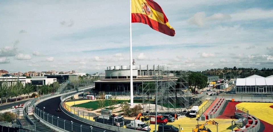 Spanish flag flying at racetrack under construction
