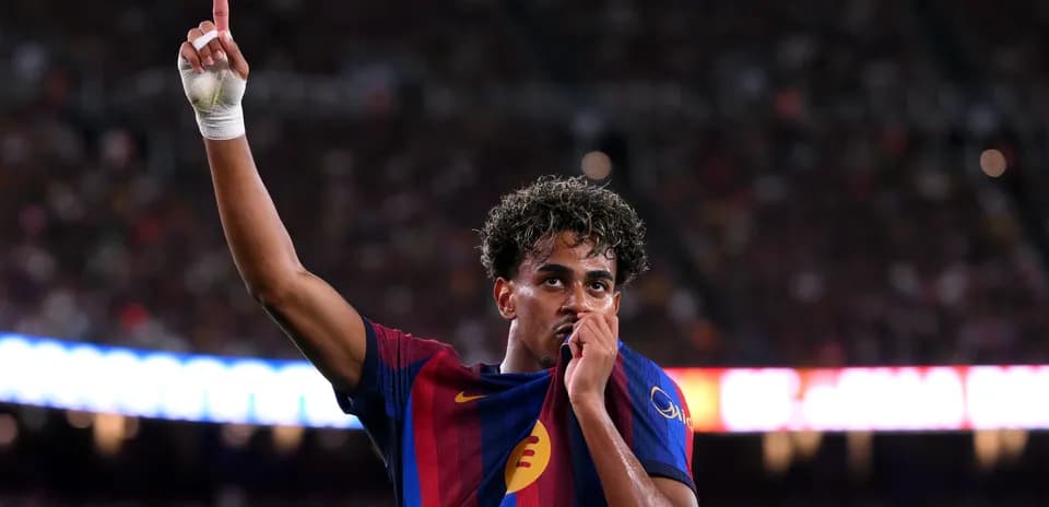 Player celebrating and kissing team jersey during match