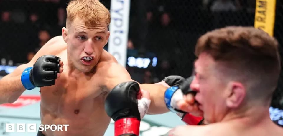 Fighter delivering a punch during an MMA match