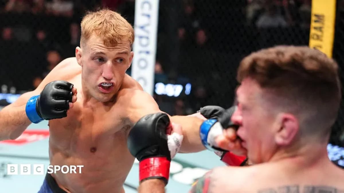 Fighter delivering a punch during an MMA match