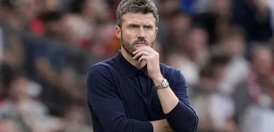 Coach observing the match from the sidelines
