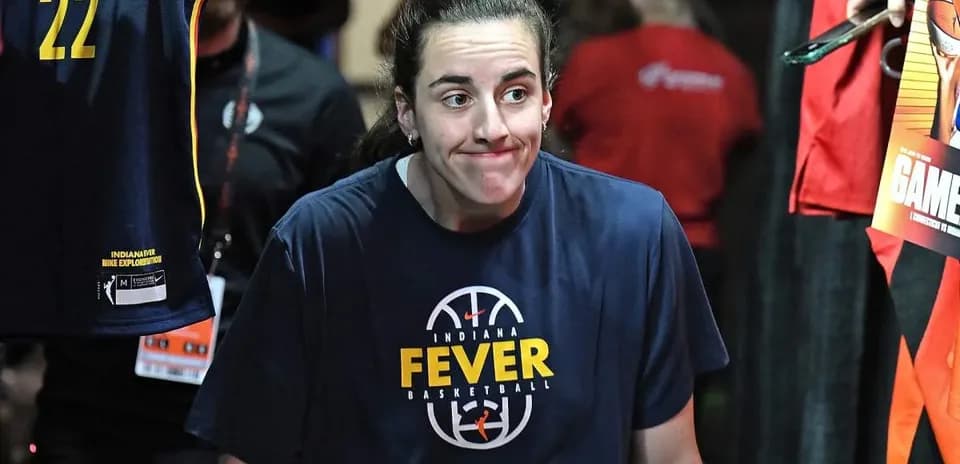 Player in Indiana Fever shirt entering the arena