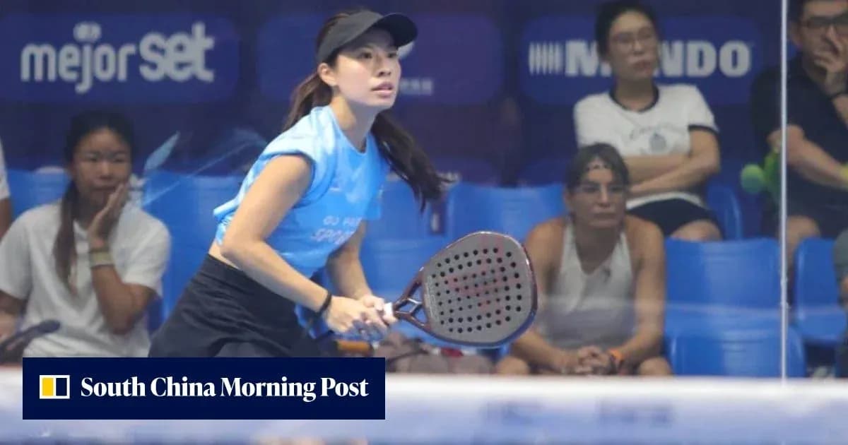 Female player preparing to hit a padel ball