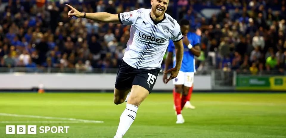 Player celebrating after scoring a goal in match
