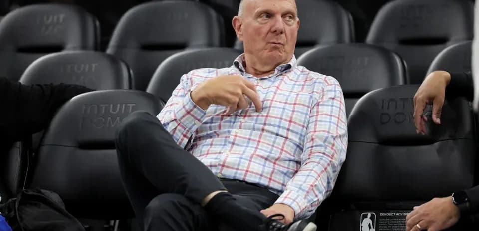 Man sitting on bench at Intuit Dome arena