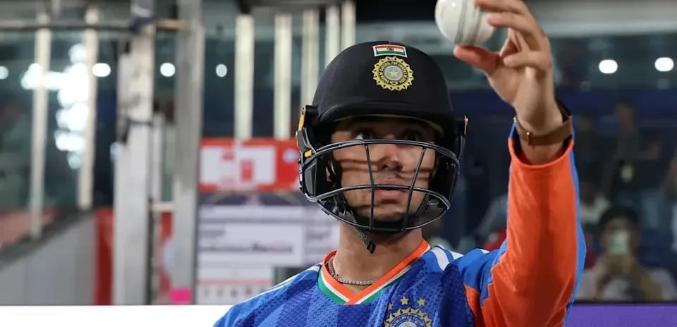 Cricketer holding a ball during practice session