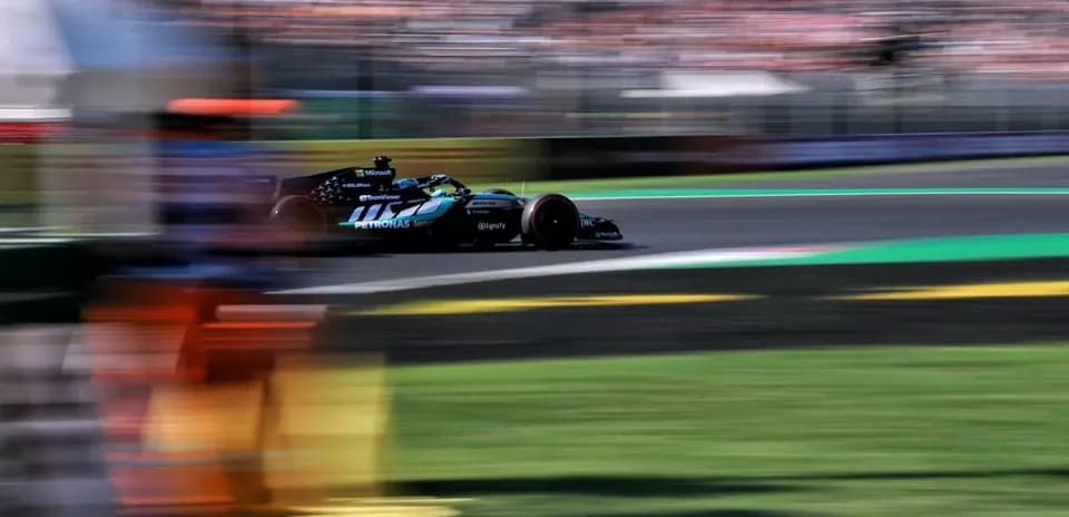 Formula 1 car racing past during a Grand Prix