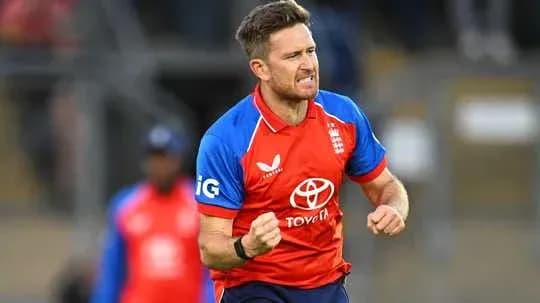 Cricketer celebrating after taking a wicket