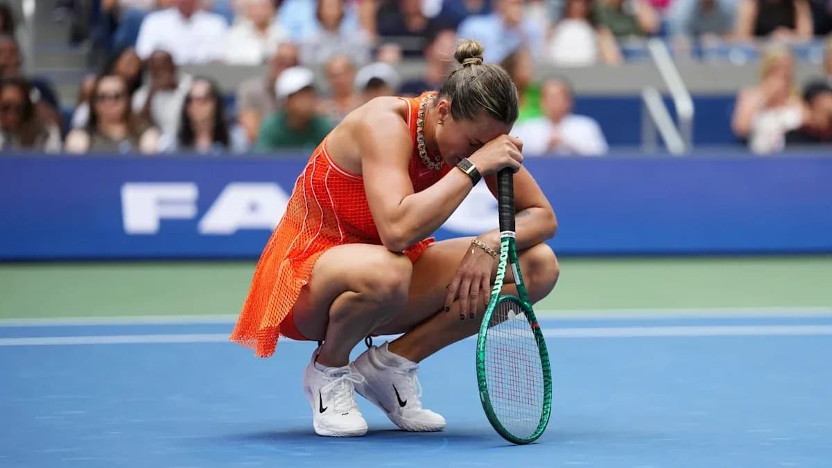 Player kneeling on court holding racket during match Player kneeling on court holding racket during match