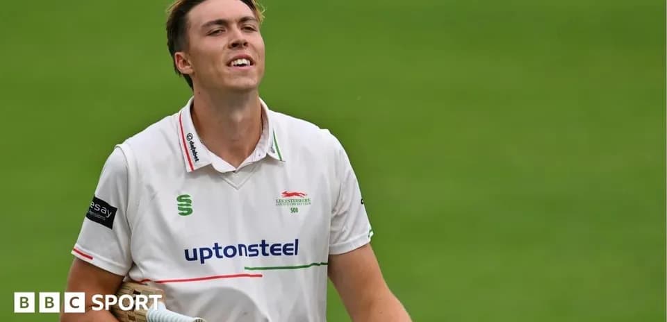Cricketer celebrating after scoring runs on the field