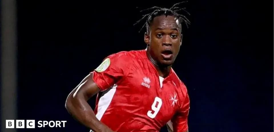 Player wearing red jersey running on the field