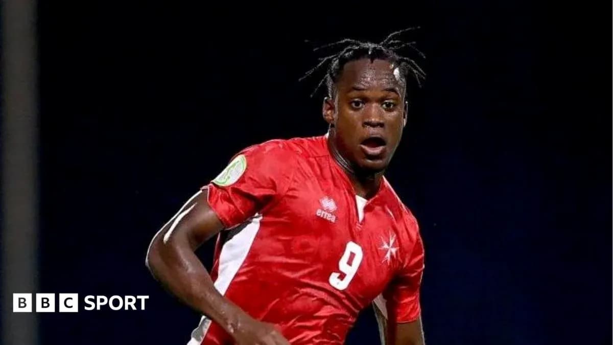 Player wearing red jersey running on the field