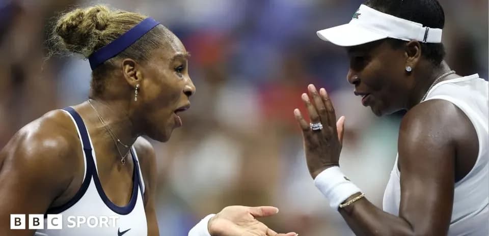 Venus and Serena Williams communicating during match