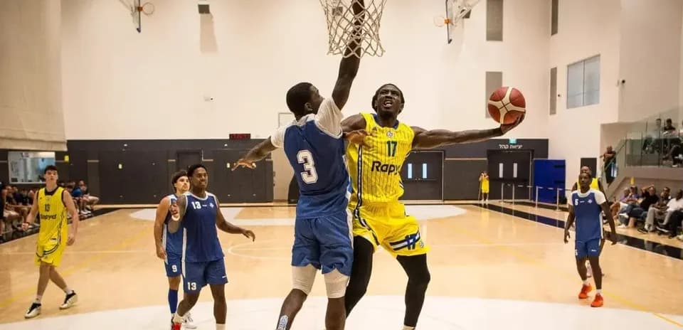 Player dunking during a basketball game action