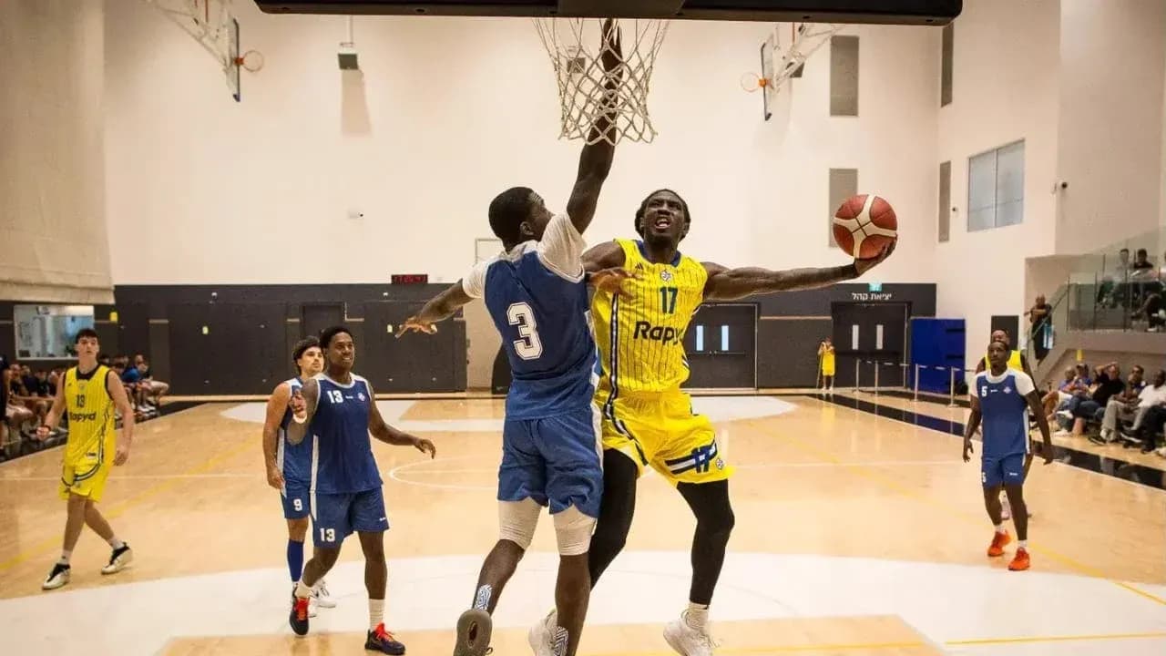 Player dunking during a basketball game action