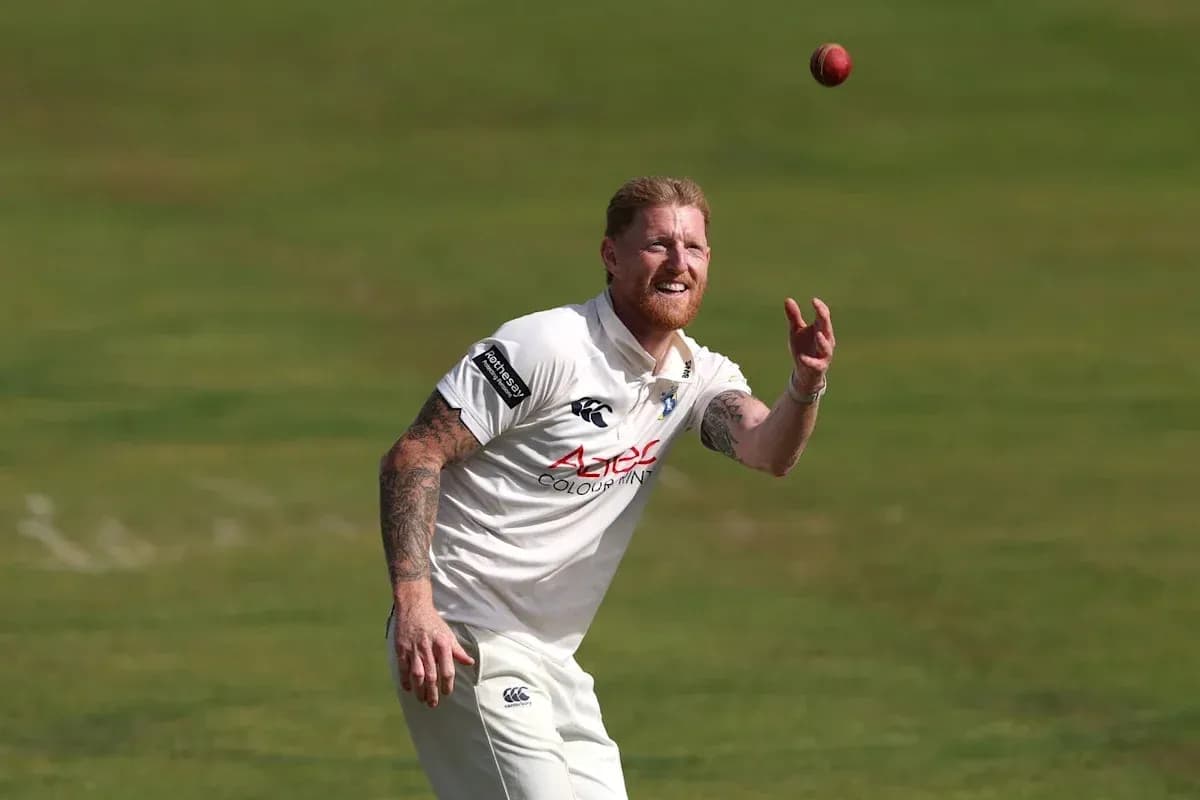 Cricketer catching ball during practice session