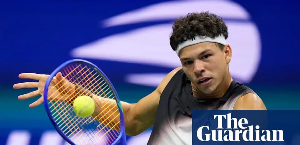 Player returning a tennis ball during match