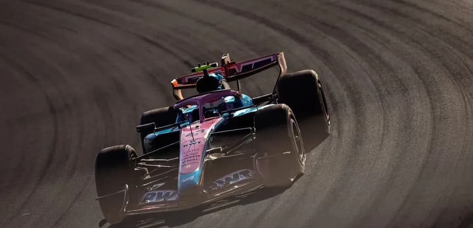 Formula 1 car drifting on racetrack corner