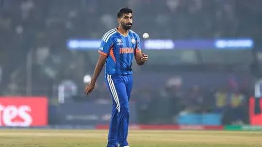 Bowler walking on the field during cricket match