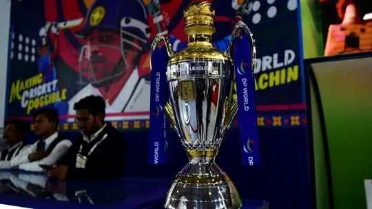 Cricket trophy displayed with promotional background