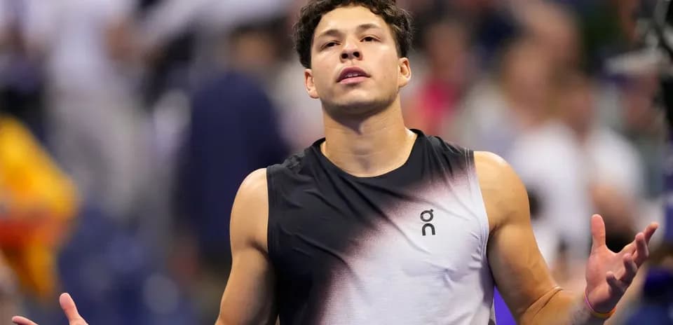 Tennis player gesturing during match at tournament