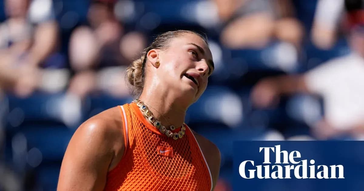 Tennis player in orange outfit during match