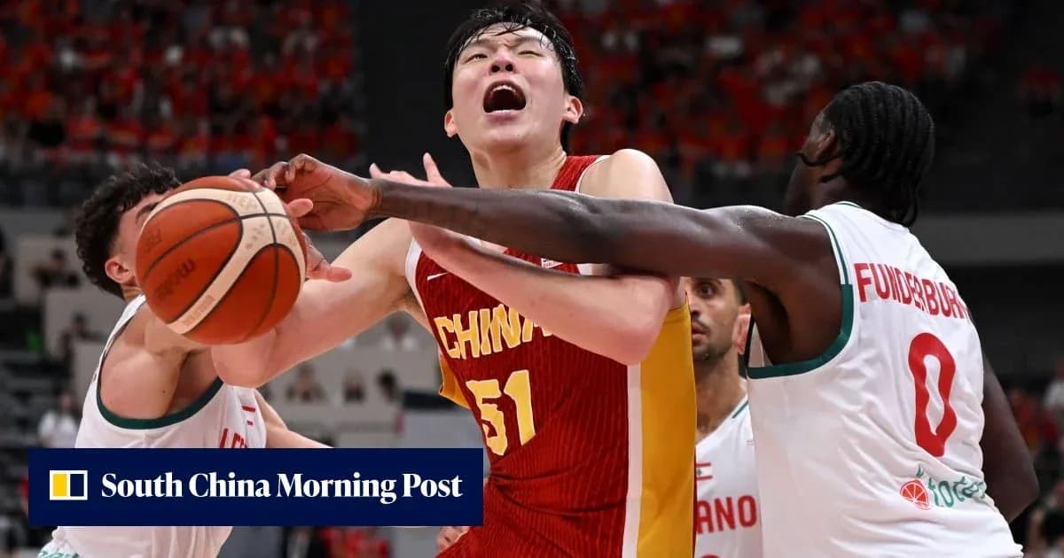 Player from China contested by two opponents for the ball