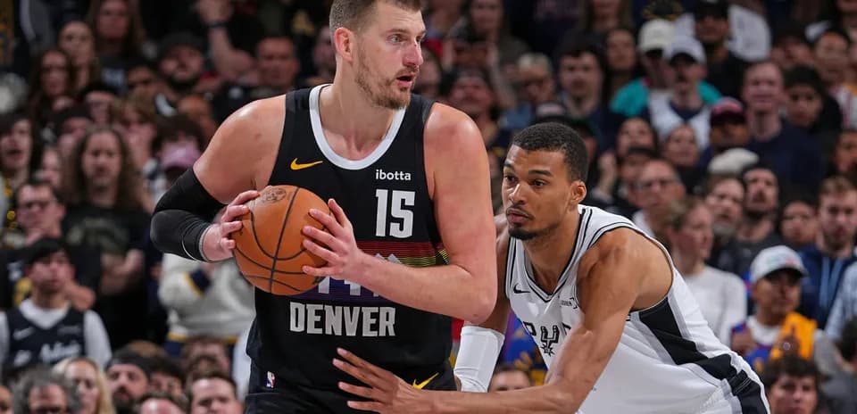 Player dribbling the ball during NBA game action