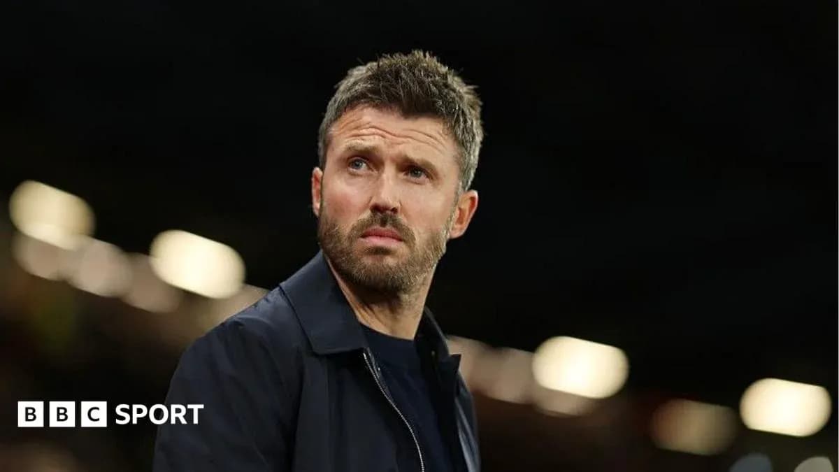 Coach observing the match from the sidelines