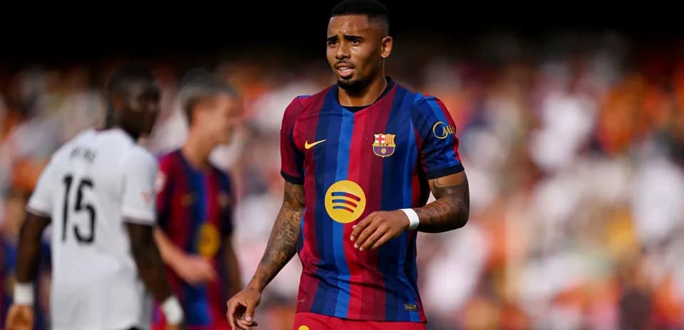 Barcelona player walking on the pitch during match