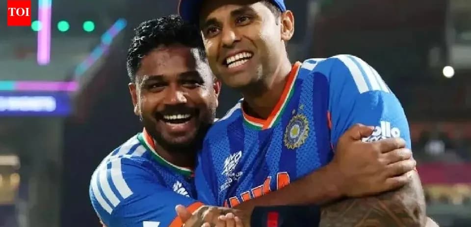 Two cricket players celebrating together after match