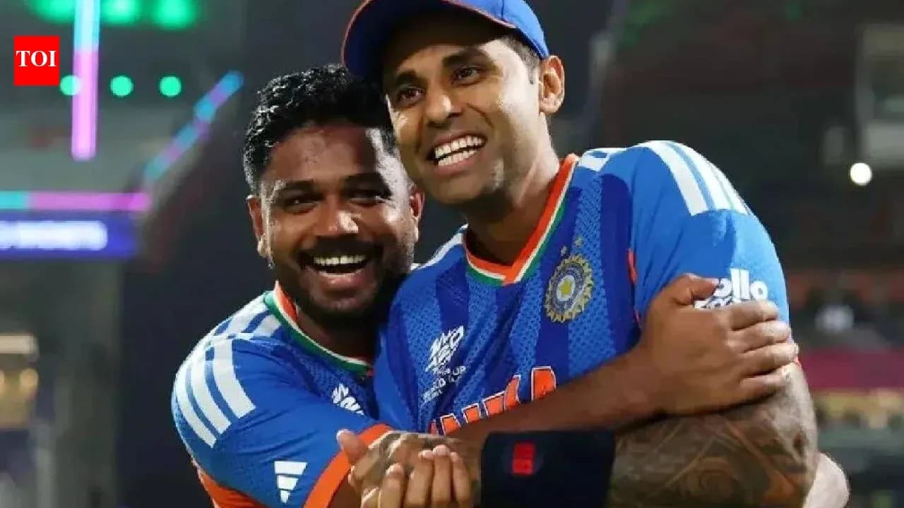 Two cricket players celebrating together after match