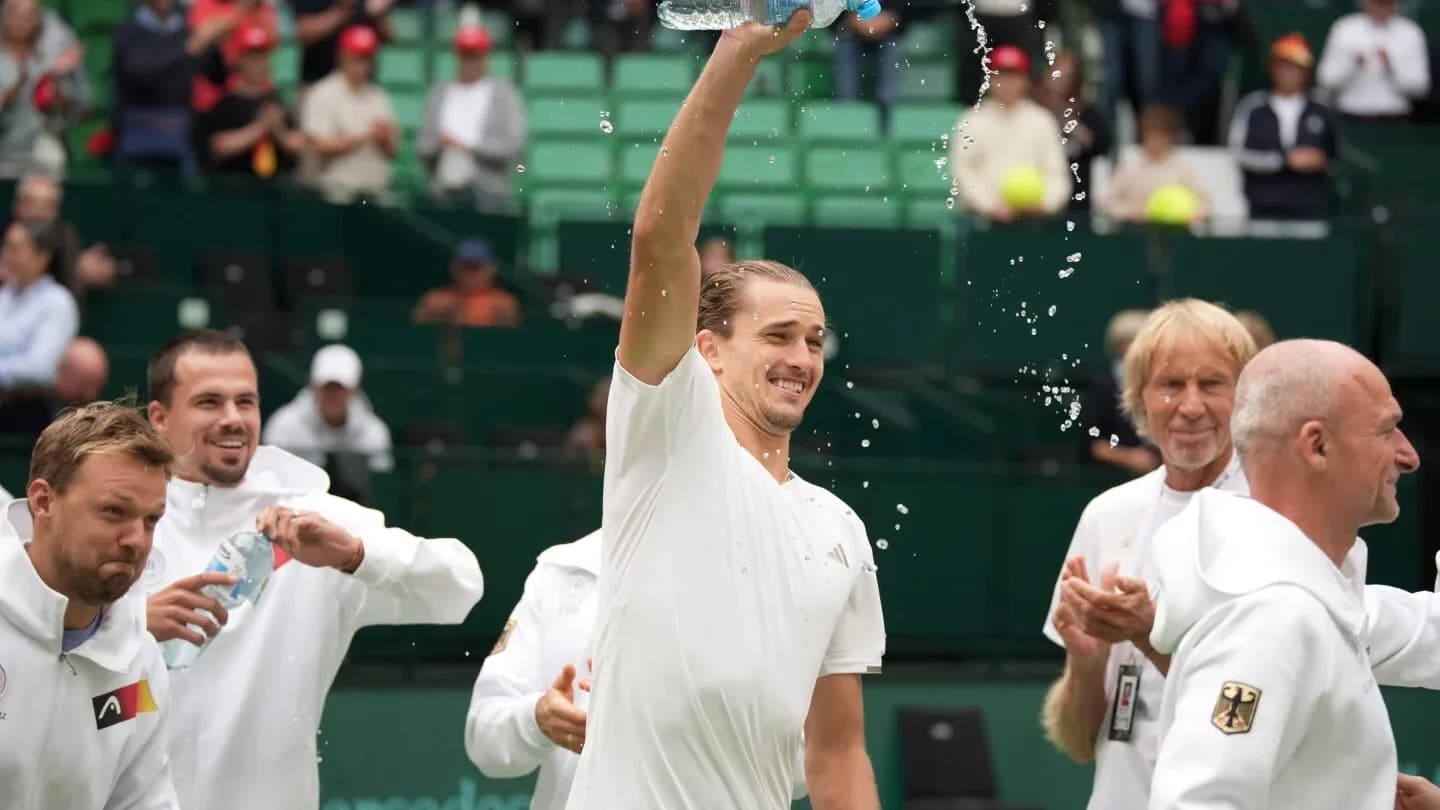 Player celebrating with teammates after match victory