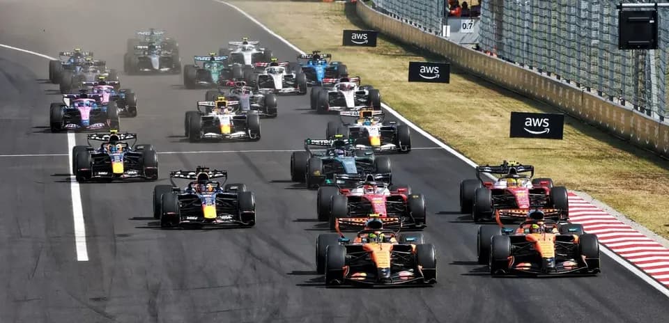 Formula 1 cars racing on track during Grand Prix