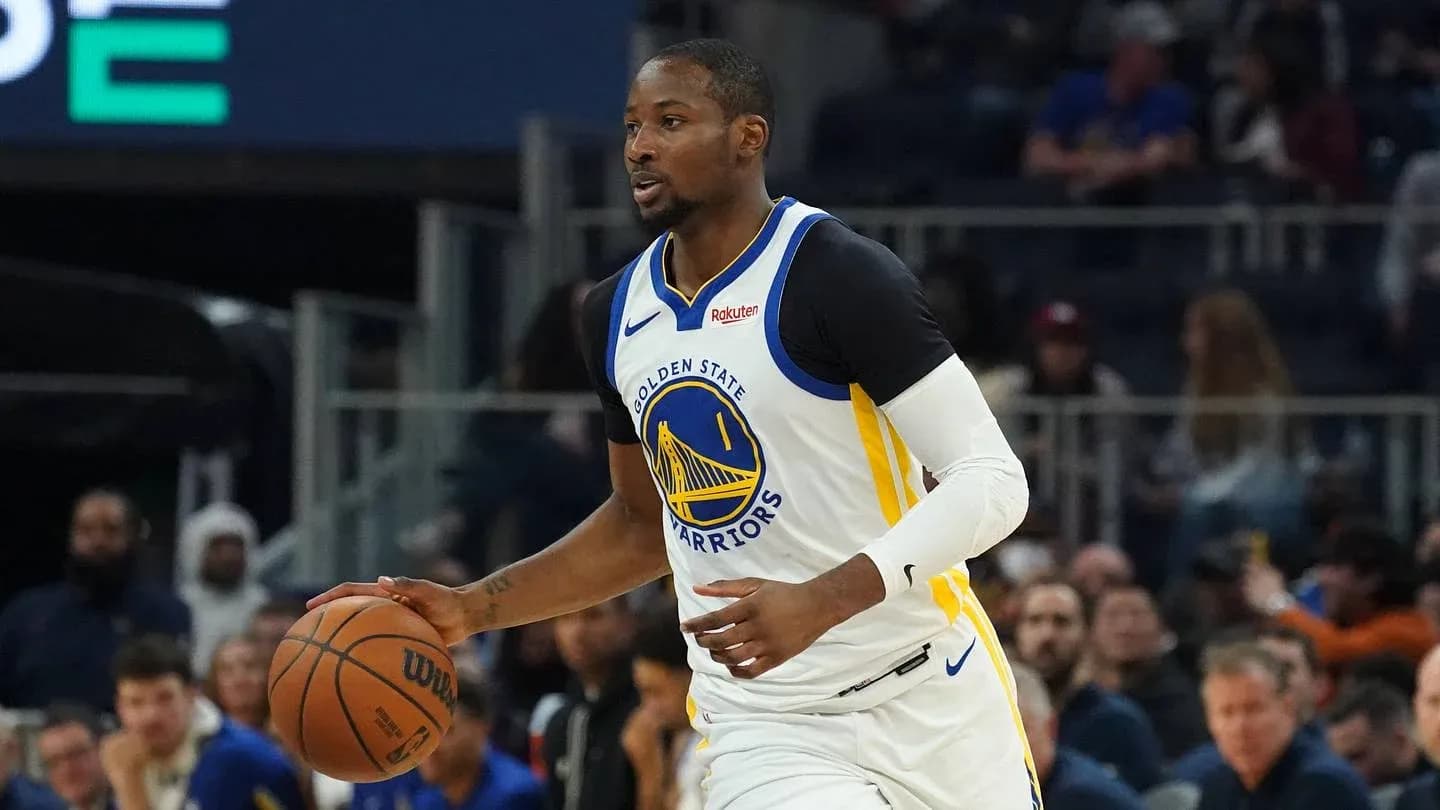 Player dribbling basketball during game action