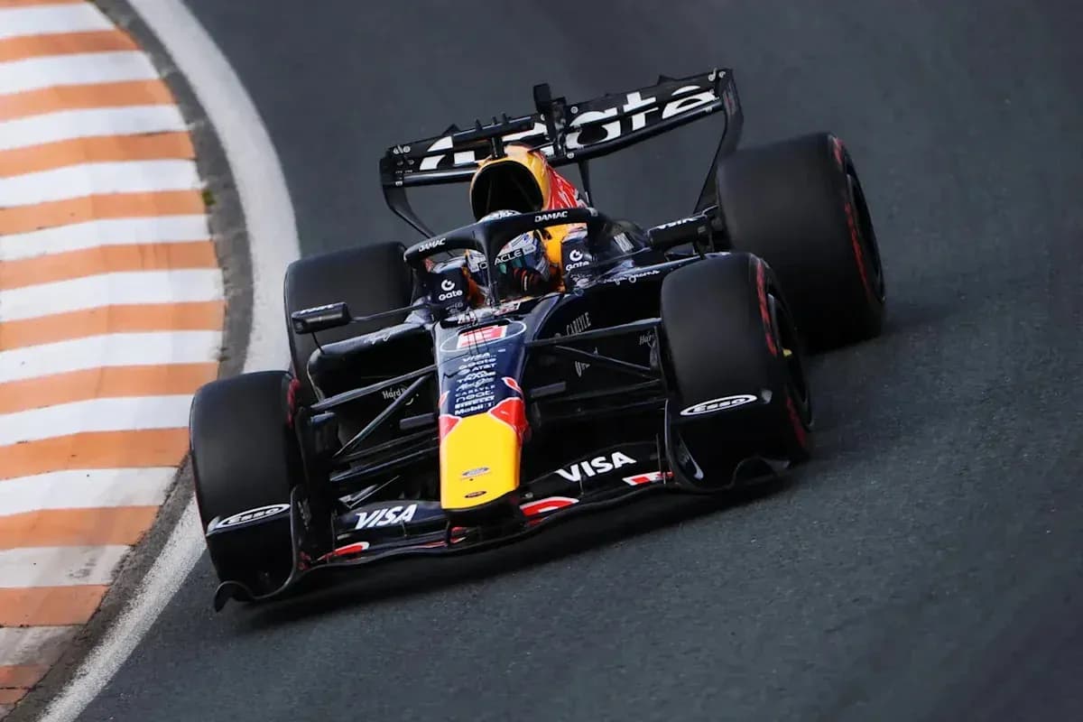 Formula 1 car racing around a curved track