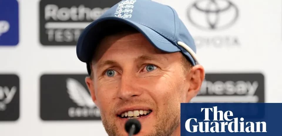 Cricketer at press conference speaking into microphone