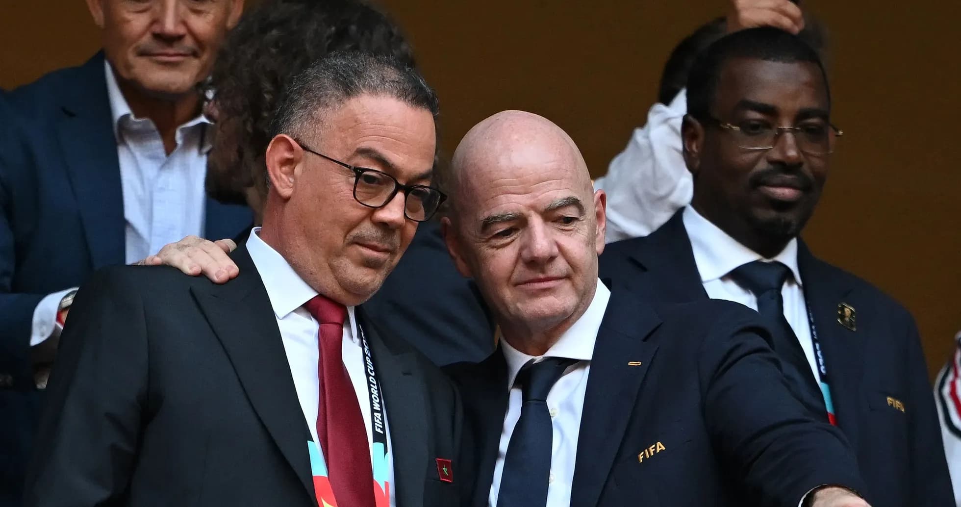 FIFA officials discussing at a World Cup event