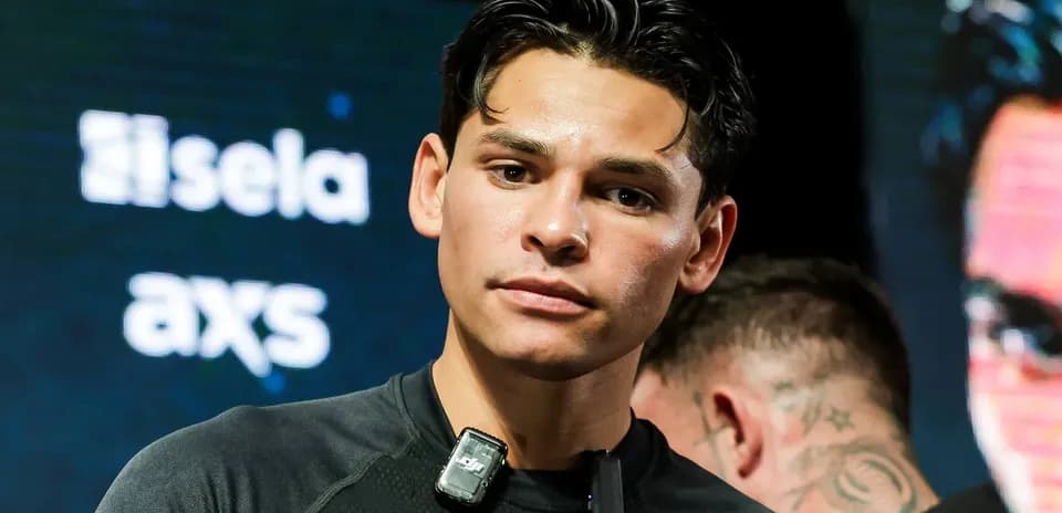 Boxer preparing for an event with microphones attached
