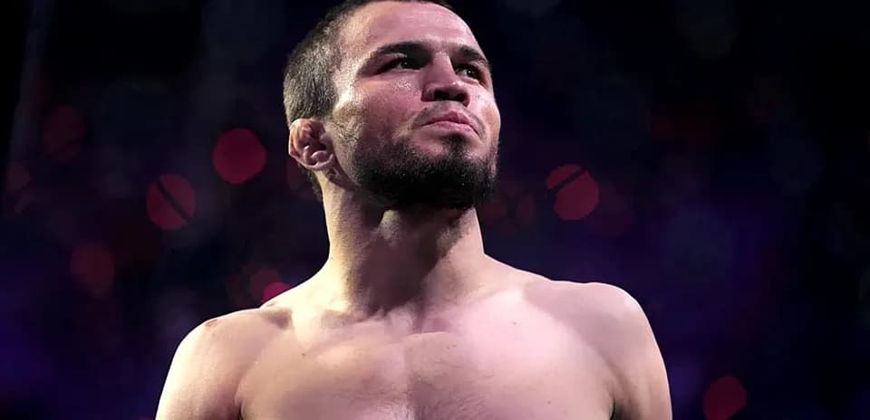 Fighter posing with focused expression before match